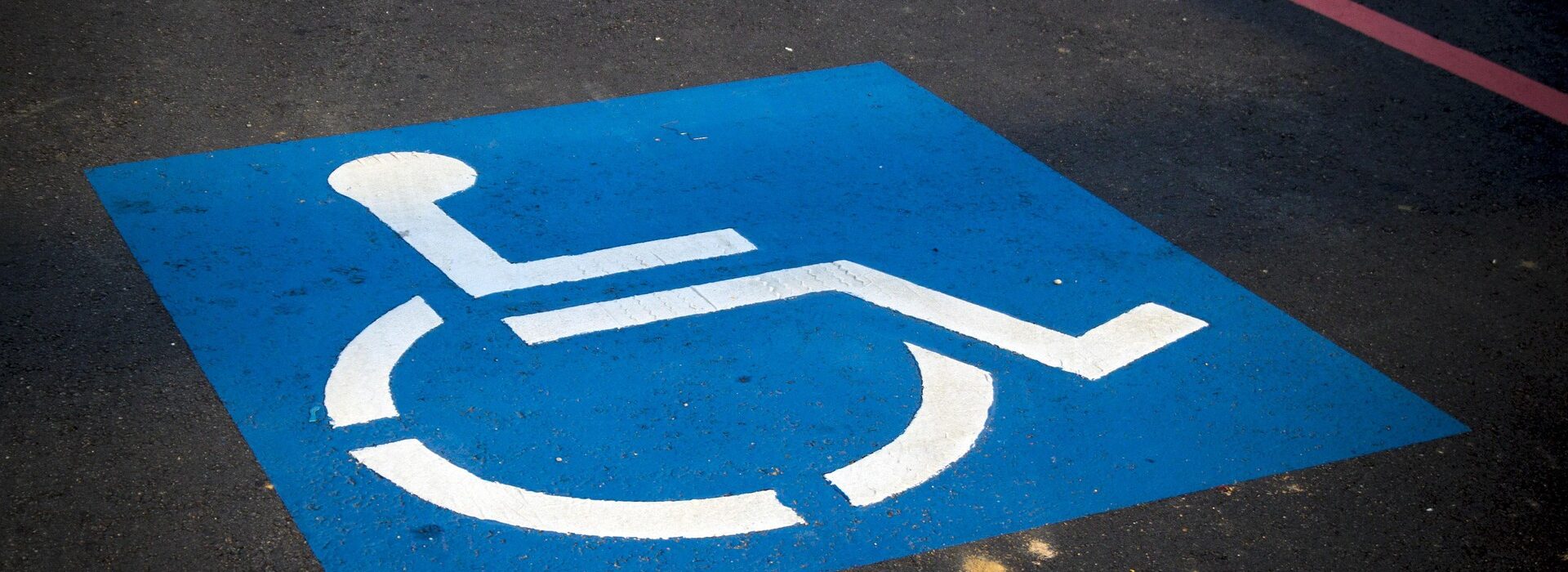A picture of a disability parking zone.